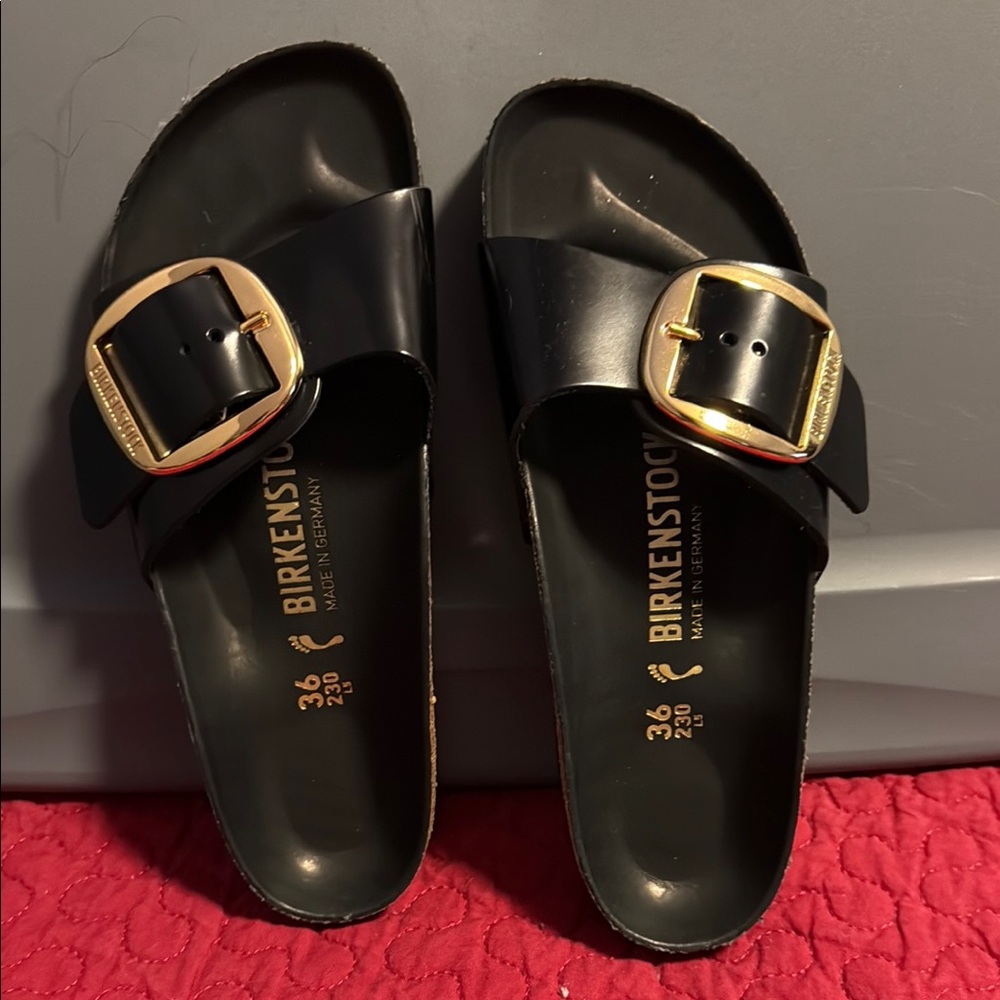 Birkenstock Black Slides with Gold Accents